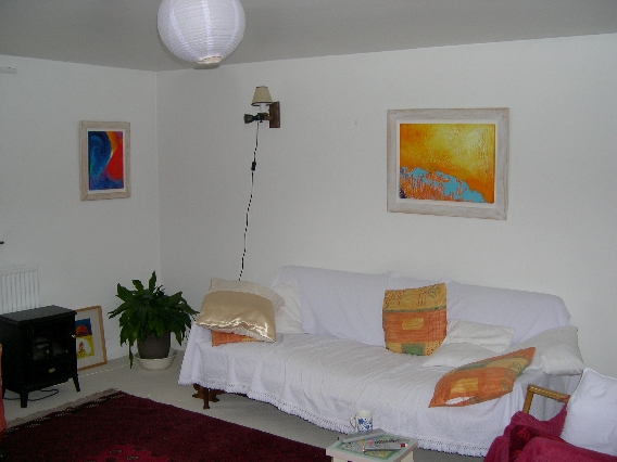 Colorful acrylic abstract painting 'Cool Rhythm' and 'Tingle' by UK artist Stella Hidden hanging in a home