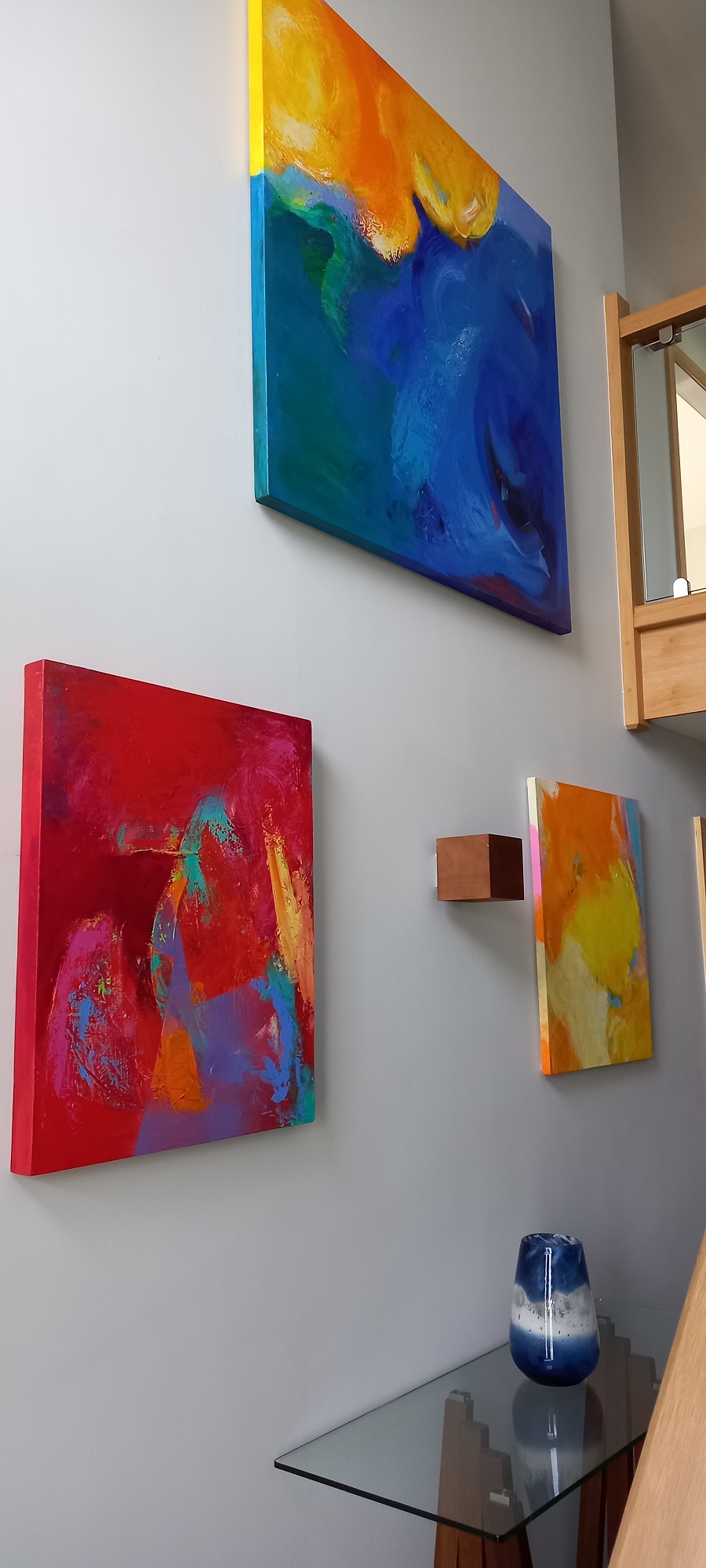 Colorful acrylic abstract painting ' ' by UK artist Stella Hidden hanging in a home