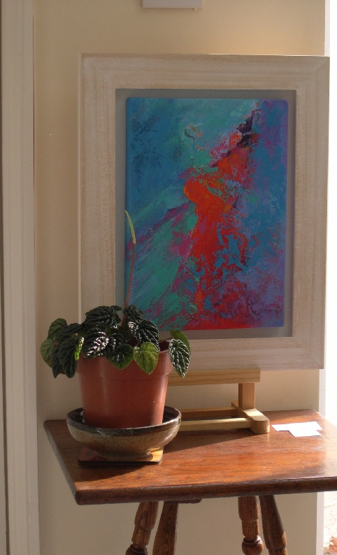 Colorful acrylic abstract painting 'Carnival Spirit' by UK artist Stella Hidden hanging in a home