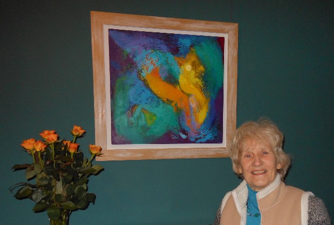 Colorful acrylic abstract painting 'Gold' by UK artist Stella Hidden hanging in a home