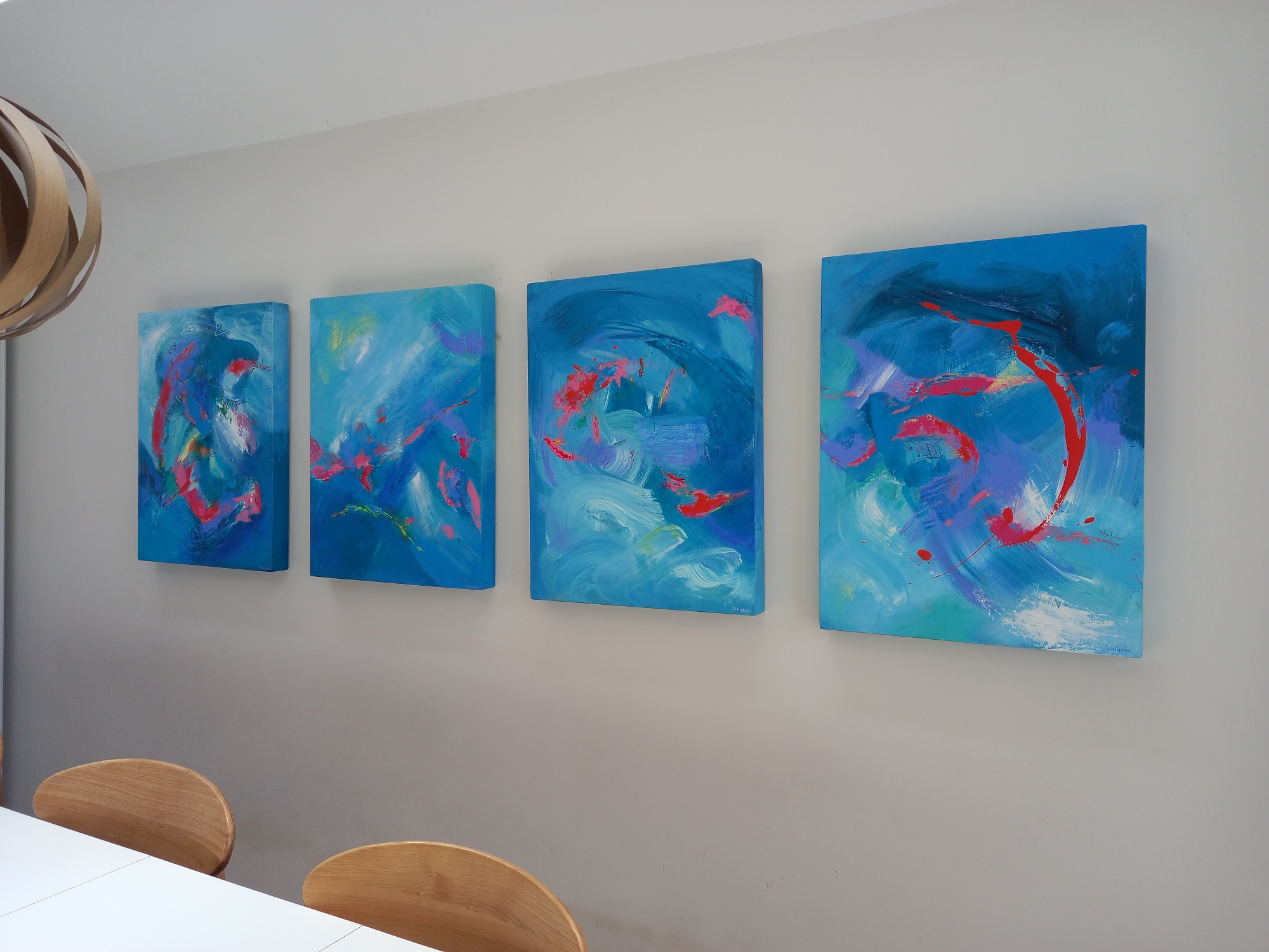 Colorful acrylic abstract painting ' ' by UK artist Stella Hidden hanging in a home