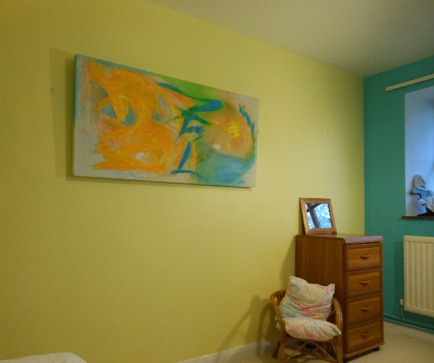 Colorful acrylic abstract painting 'Momentarily' by UK artist Stella Hidden hanging in a home