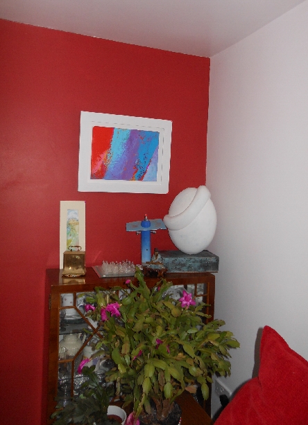 Colorful acrylic abstract painting 'Indian Poem' by UK artist Stella Hidden hanging in a home